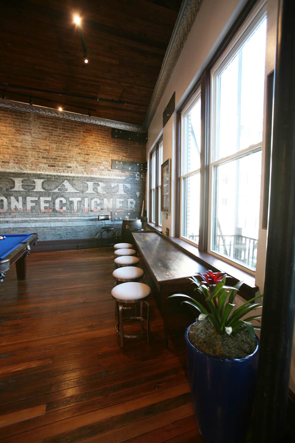 Historic painted brick wall beside the loft windows