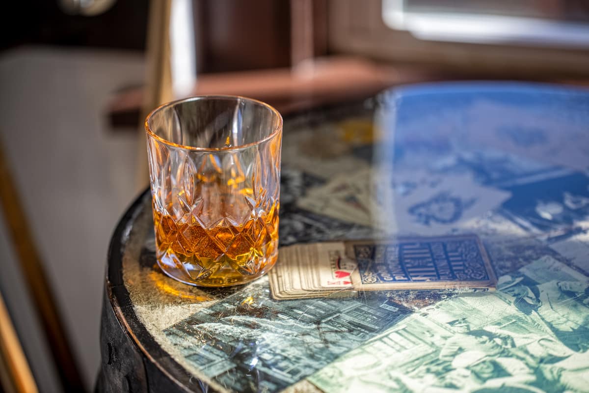 Cocktail displayed with vintage Hot Springs memorabilia